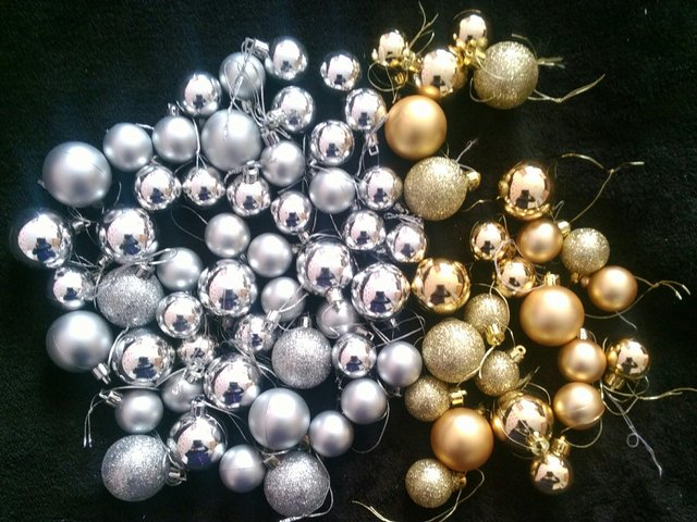 Preview of the first image of Over 75 Gold and Silver Baubles.