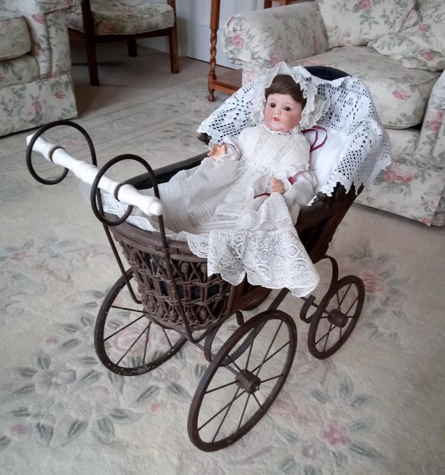 Preview of the first image of German Antique Doll with Repro Antique Pram.