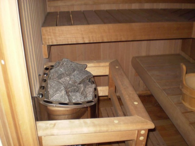 Preview of the first image of SAUNA BY KOTI SEATS FOUR IN ALDER WOOD.