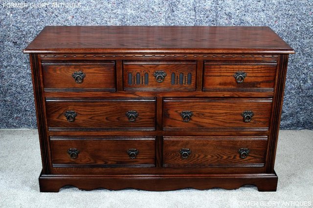 Preview of the first image of OLD CHARM TUDOR BROWN CARVED OAK CHEST OF DRAWERS SIDEBOARD.
