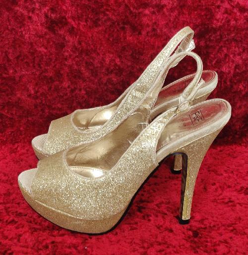 Preview of the first image of Ladies Brand New Gold Glittered Stiletto Shoes - Size 7.
