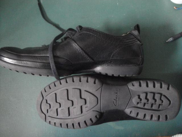 Preview of the first image of Clarks Black Trainer Style Shoes. Unused. Size 10.5 G..