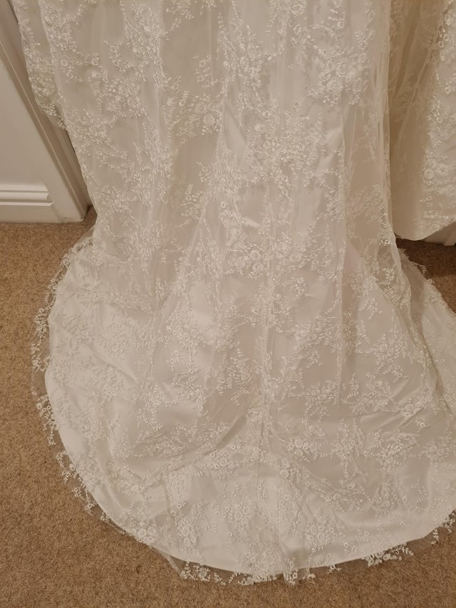 Image 3 of Ivory lace tulle wedding dress. Size 12