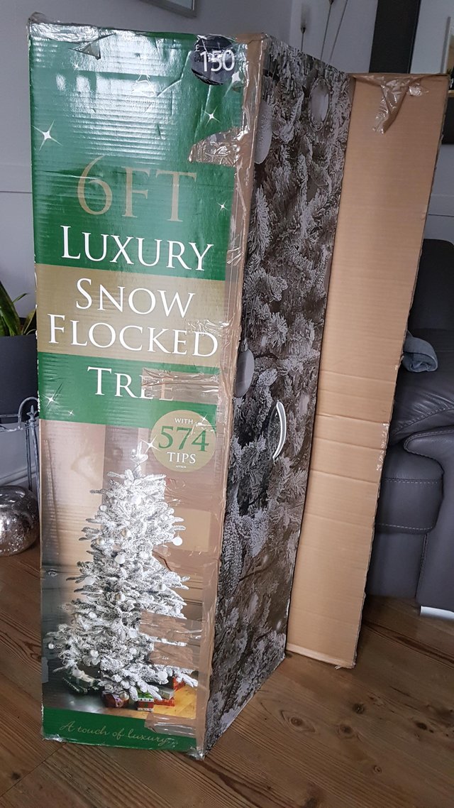 Preview of the first image of SIX FOOT CHRISTMAS TREE FOR SALE.BRAND NEW NEVER USED.