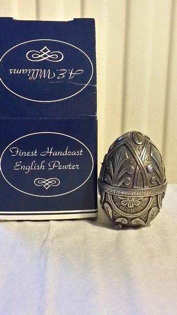 Preview of the first image of Pewter decorative egg shaped container / ornament.