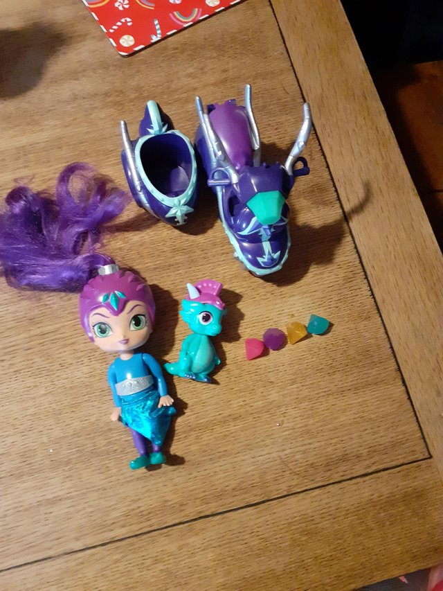 Preview of the first image of Shimmer and shine figure with bike.
