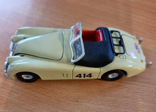 Preview of the first image of Corgi Jaguar XK 120 Unboxed in Cream.