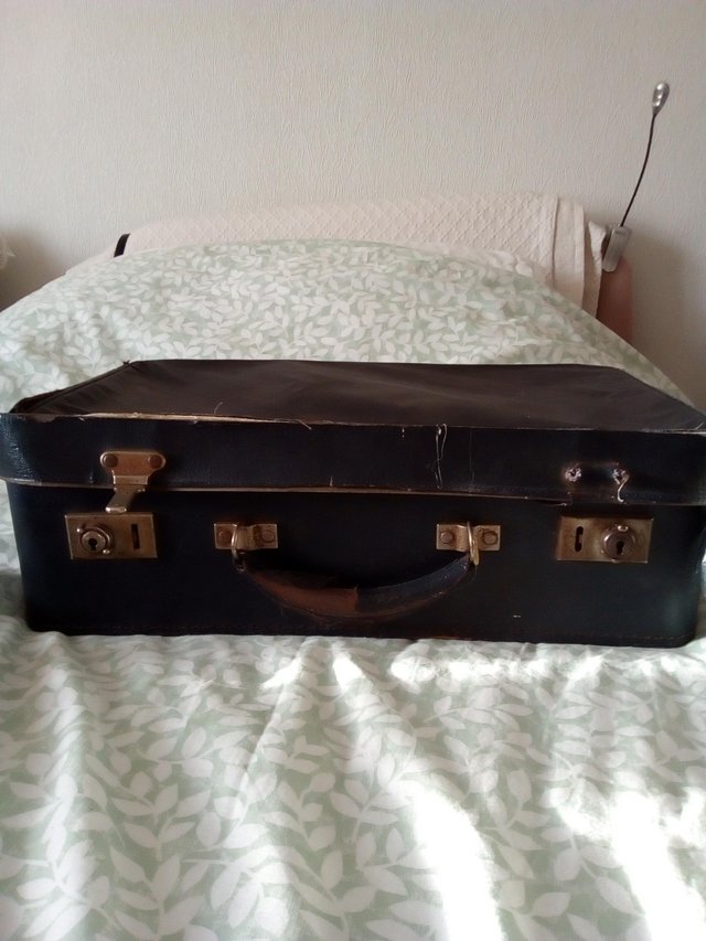 Preview of the first image of VINTAGE SMALL NAVY SUITCASE NEEDS RESTORATION.
