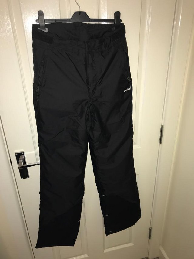 Preview of the first image of Youths Black Trousers Decathlon Wedze Piste 500.
