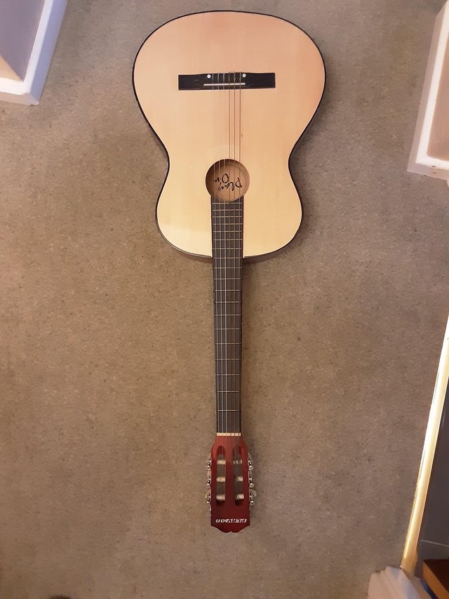 Preview of the first image of Toys R Us Play On Children's Guitar.