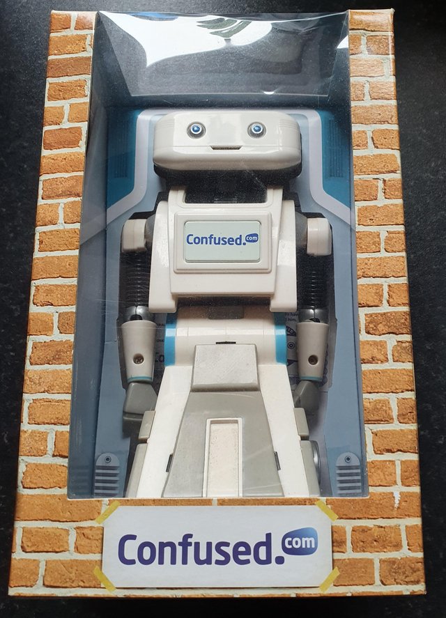 Preview of the first image of Brian Confused Robot in box with certificate of authenticity.