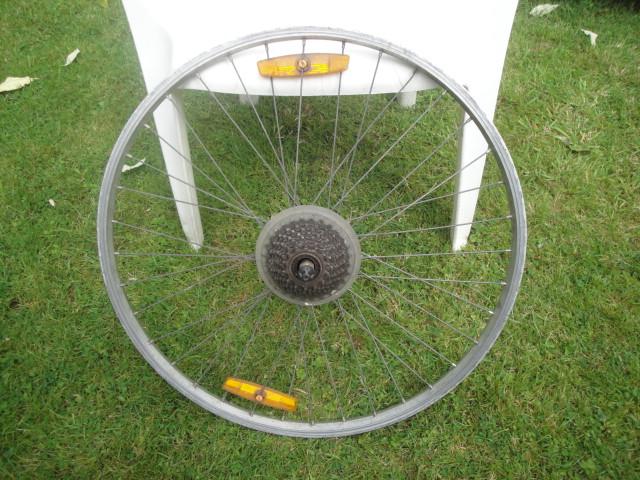 Preview of the first image of Bike Rear Wheel with 7 cog sprocket.Size 26in. Used..