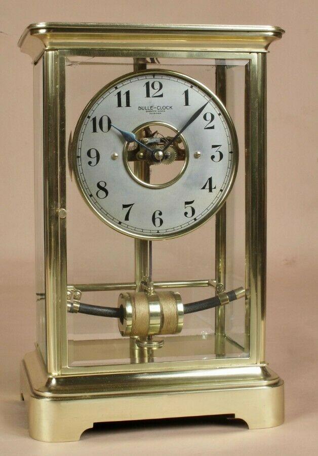Preview of the first image of Bulle Electric Four sided glass and brass clock circa 1920's.