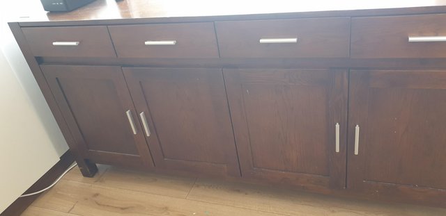 Second hand dark wood shop sideboard