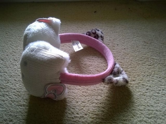 Preview of the first image of Hello Kitty gloves and earmuffs.