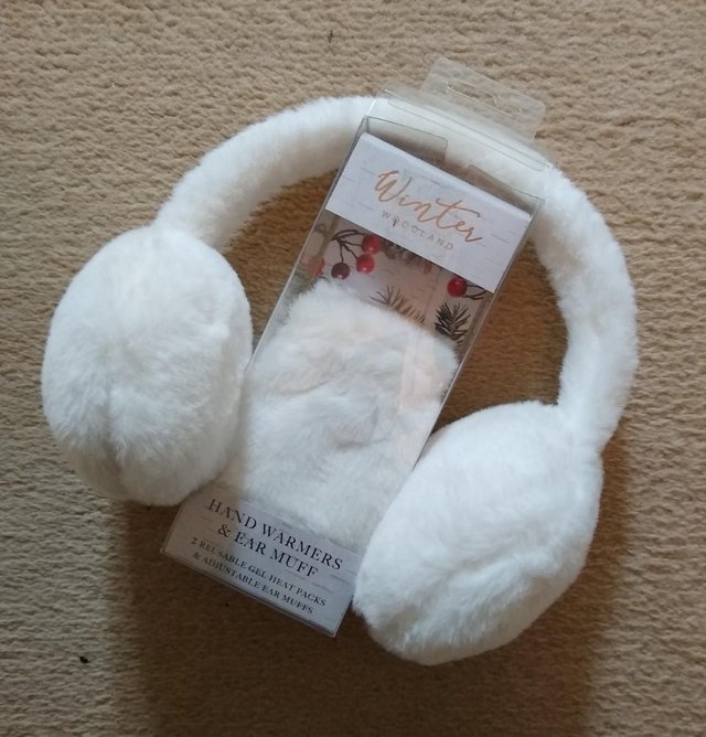 Preview of the first image of White fluffy handwarmer and earmuff set.