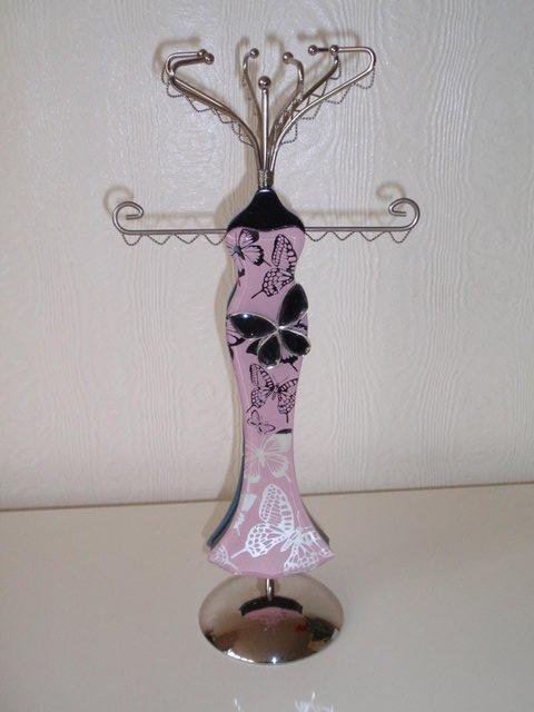 Preview of the first image of Pink and Silver Metal Jewellery Stand in shape of a dress.