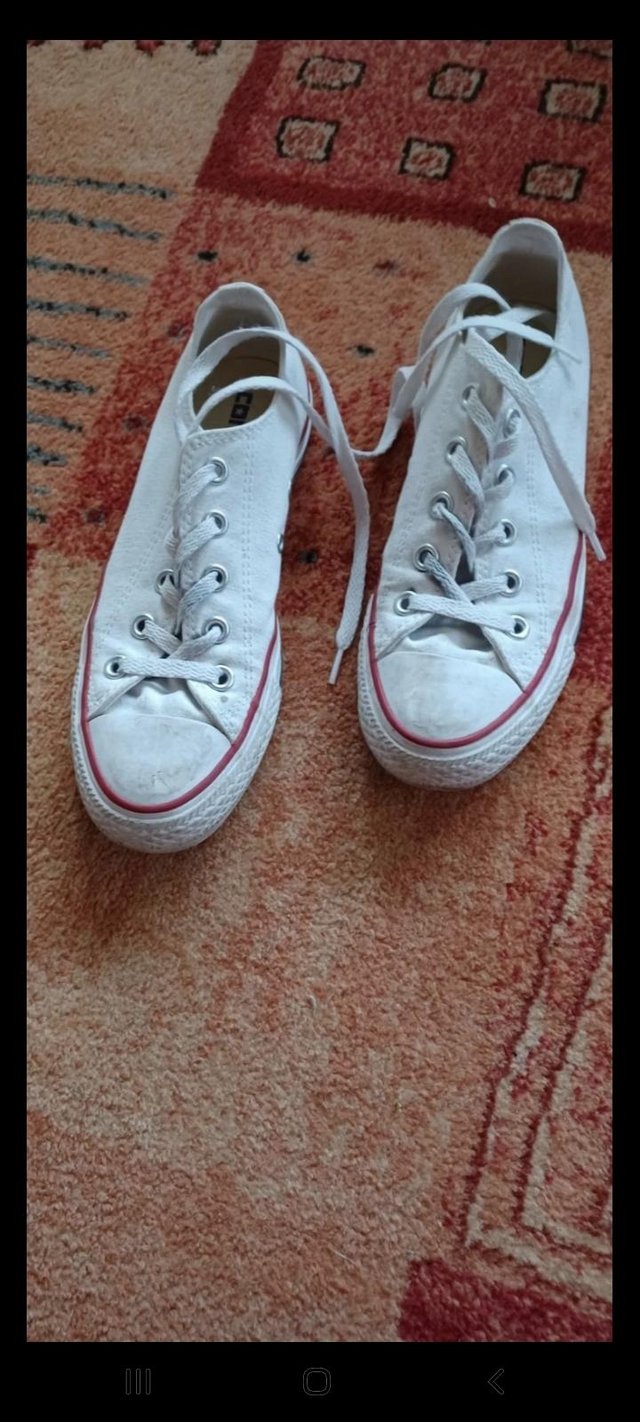 Preview of the first image of Women's All Star white Converses.