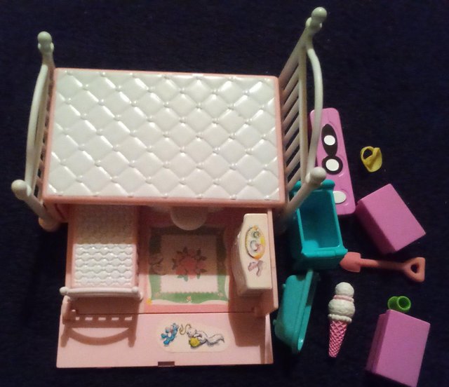 Preview of the first image of Polly Pocket Foldaway Bed plus accessories.