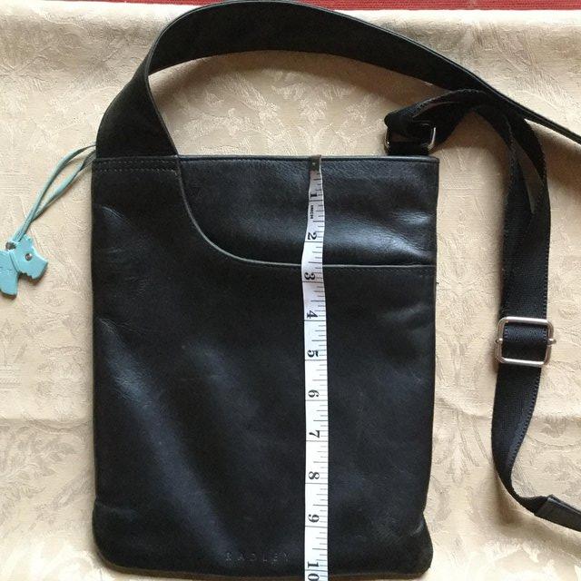 Preview of the first image of RADLEY Black Leather Pocket Across Body Bag.