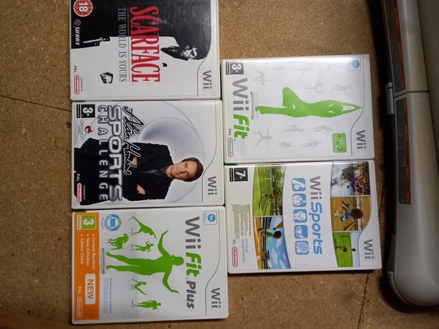 Preview of the first image of Wii & Wii Fit Plus Board & Games.