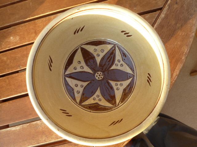 Preview of the first image of Earthenware bowl with attractive pattern inside.