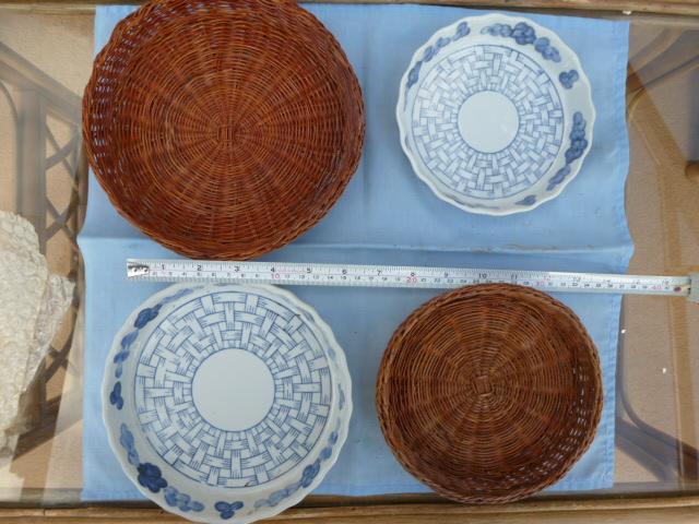 Image 2 of Ornamental plates on fine wicker bases