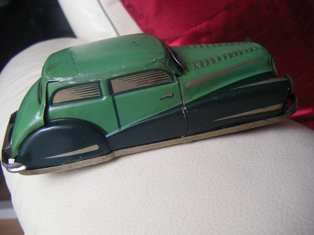 Preview of the first image of Clockwork tinplate car Joustra France 1950s Working.