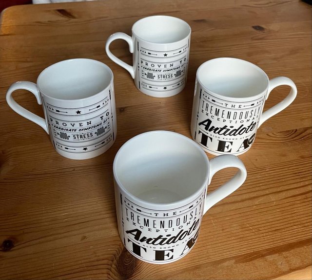 Preview of the first image of 4 X UNUSED MATCHING VINTAGE MUGS 100% BONE CHINA.